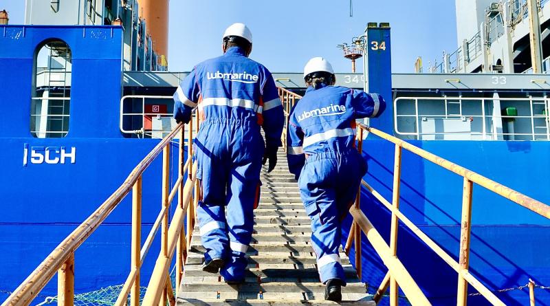 Marine Lubricant Engineers climbing a vessel's ladder