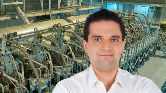 ©TotalEnergies Ahmad Salem with a 2-stroke engine background