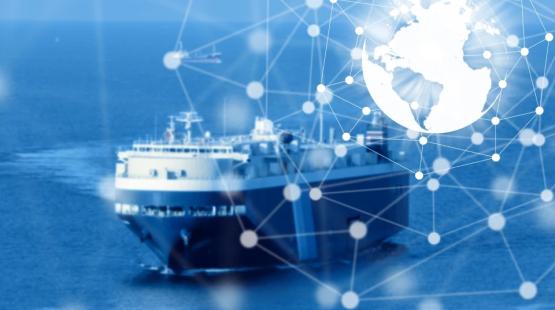 A RoRo ship at sea with a blue filter and a world map icone