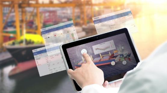 Shipping operator consulting Lubmarine digital portal on a tablet
