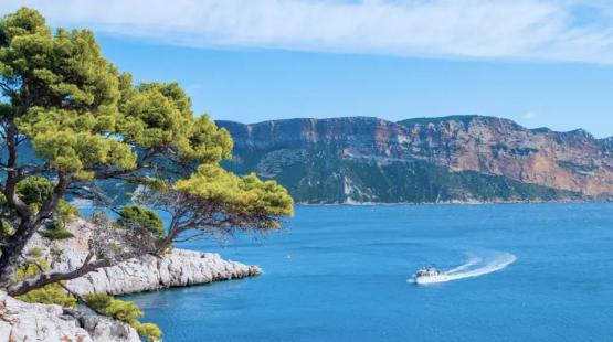 Mediterranean Sea coast view with a small ship