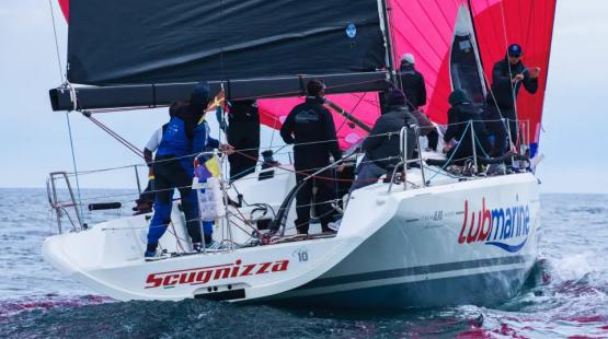 Scugnizza Racing Boat with Lubmarine Logo