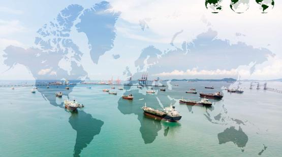 Photo ©Surapol Usanakul (– Shutterstock) - TotalEnergies Tanker ships on the sea and shadow of a world map overlaying the picture
